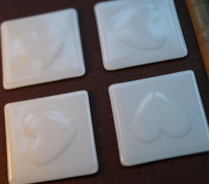 Heart impression design white fused art glass coaster 100x100mm size on packing trunk