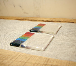 Rainbow design clear iridescent fused art glass coaster 100x100mm size angled view